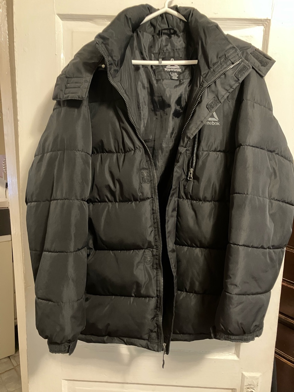 Used, but like new  men’s L. Women XL. Reebok black puffer jkt with removable